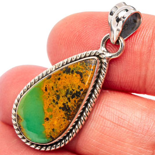 Sterling silver turquoise teardrop pendant with textured bezel and bail, multicolor stone