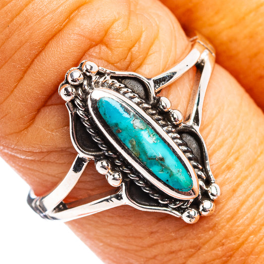 Turquoise oval sterling silver ring with ornate bezel and beaded details