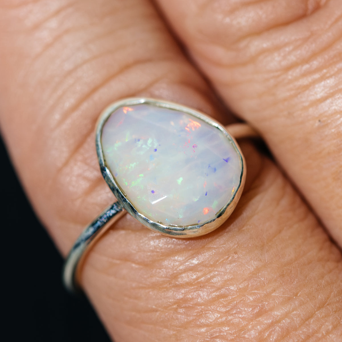Sterling silver dainty ring with oval Ethiopian opal centerpiece, size 9.75