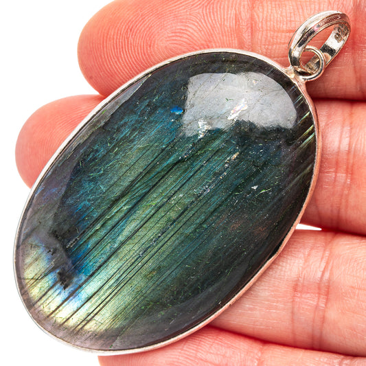 Labradorite oval pendant with silver-plated bezel and loop bail, blue-green shimmer
