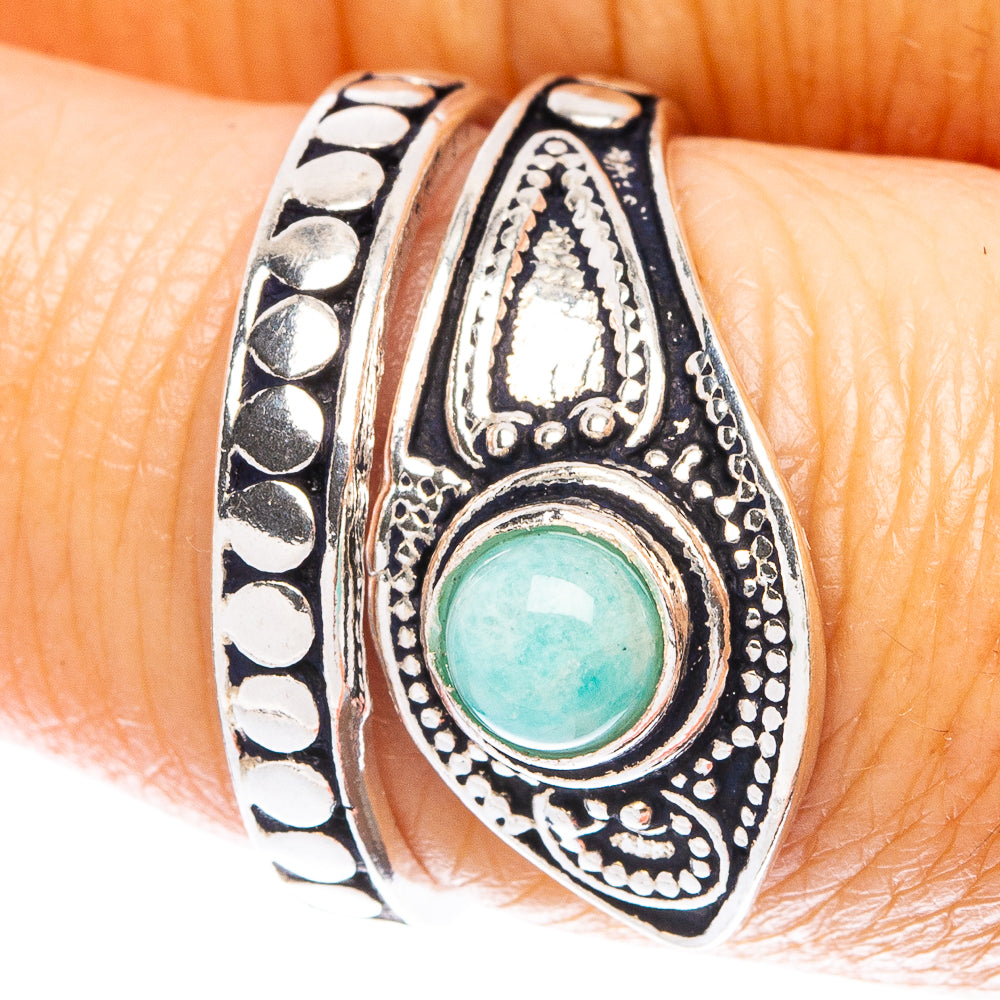Dainty sterling silver ring with turquoise oval gemstone and decorative filigree sides