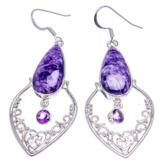 Sterling silver amethyst drop earrings with large pear-shaped stones and small round center gems