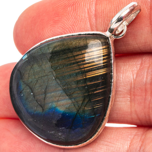 Silver-plated labradorite teardrop pendant with blue-green iridescence and loop bail