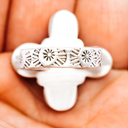 Sterling silver cross ring with engraved southwestern pattern band