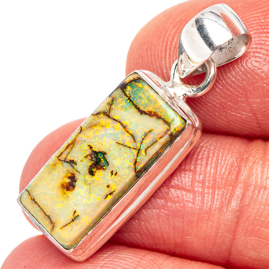 Sterling silver opal pendant with rectangular yellow-green stone and open bail