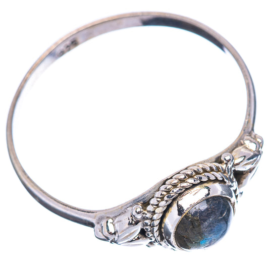 Sterling silver labradorite ring with oval dark-blue gemstone, braided prong setting