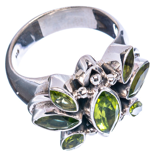 Sterling silver ring with green peridot marquise and round stones, floral openwork