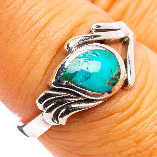 Sterling silver ring with oval turquoise cabochon gemstone