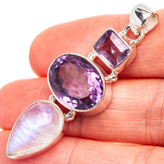 Sterling silver pendant with oval purple gemstone, square violet gem, and moonstone teardrop