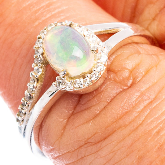 Sterling silver opal ring with oval Ethiopian opal and cubic zirconia halo, size 7