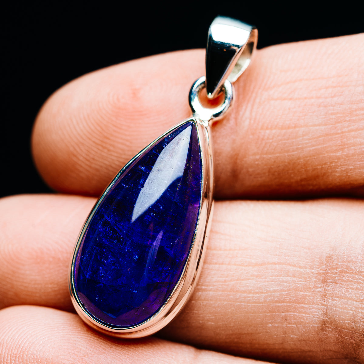 925 sterling silver teardrop pendant with deep blue tanzanite gemstone and bail loop