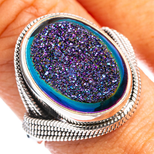 Oval druzy gemstone ring with iridescent purple-blue glitter set in sterling silver
