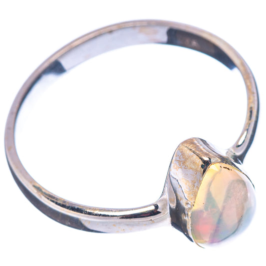 Sterling silver opal ring with oval opal cabochon and polished band