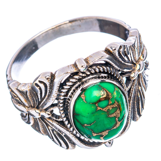 Sterling silver ring showing green turquoise oval cabochon with leaf and butterfly accents