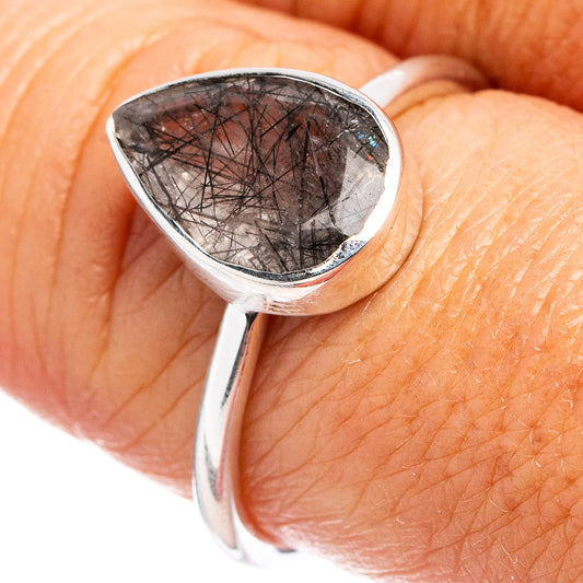 Sterling silver ring with oval tourmalinated quartz cabochon, black needle inclusions.