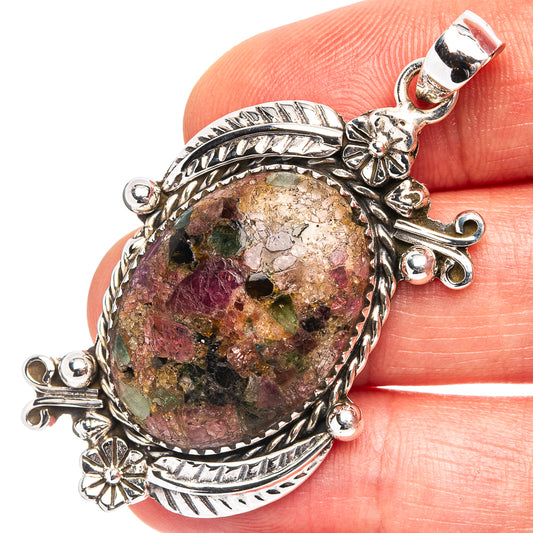 925 sterling silver oval tourmaline matrix pendant with ornate floral bezel