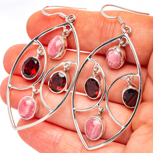 Sterling silver teardrop hoop earrings with pink oval and dark red stones