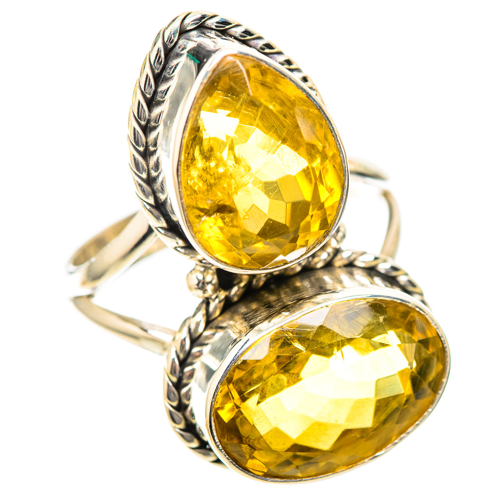 Silver ring with two stacked faceted oval citrine stones and twisted rope edges
