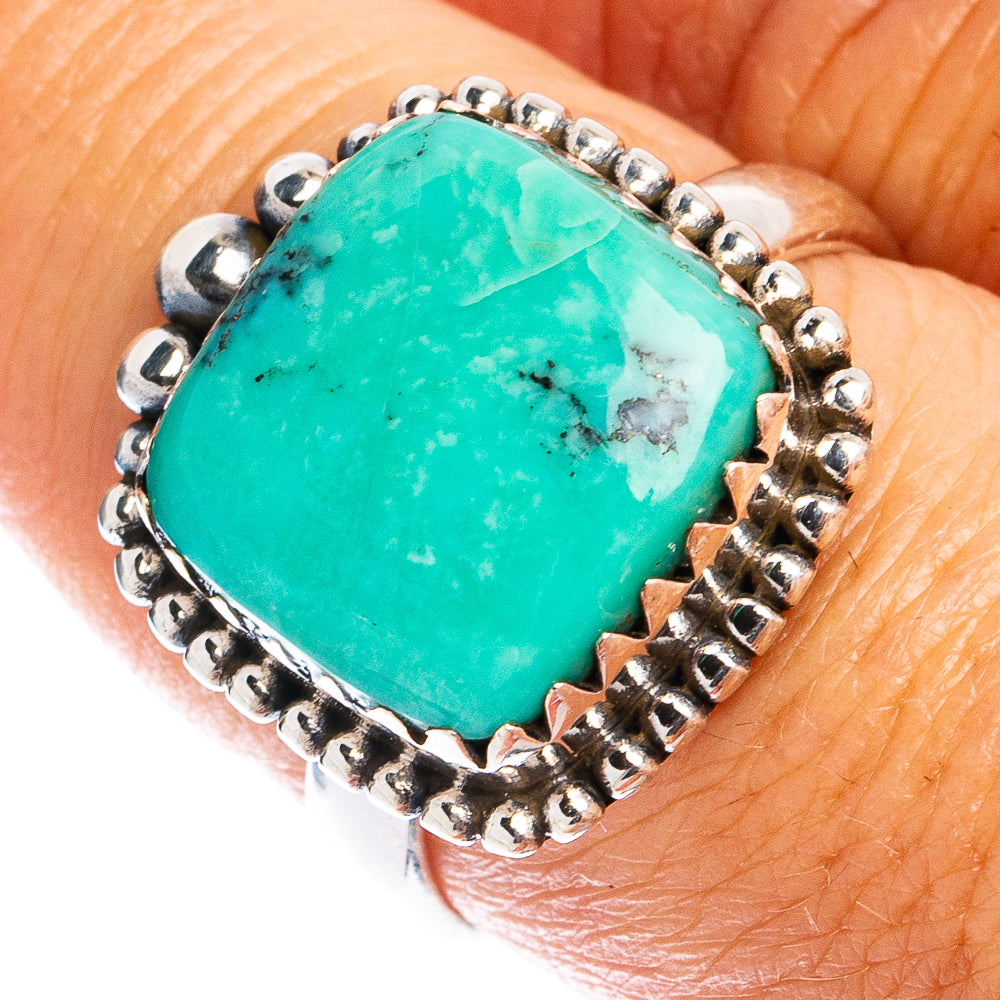 Sterling silver ring with oval turquoise cabochon and beaded bezel edge