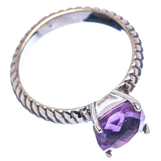 Sterling silver amethyst ring, ribbed band with purple faceted oval stone on prongs