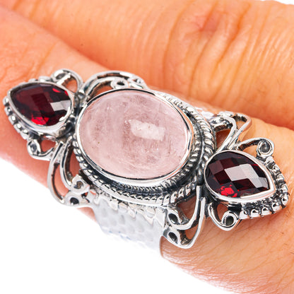 Size 7 sterling silver ring with pink oval morganite bezel and red garnet side settings