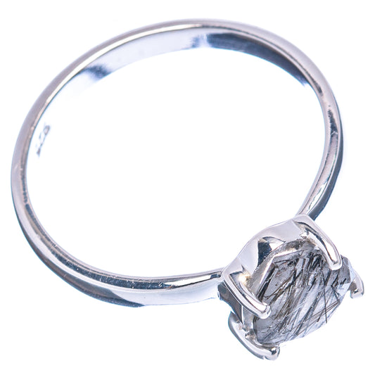 Polished sterling silver ring with tourmalinated quartz stone in raised bezel