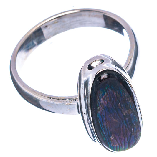 Sterling silver ammolite ring with oval dark iridescent stone, open top setting