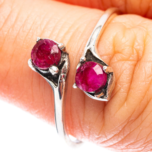 Sterling silver ring with two oval red sillimanite gemstones on prongs