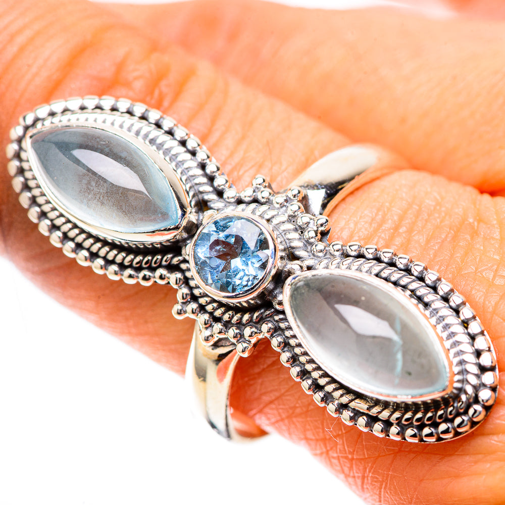 925 sterling silver ring with blue round gemstone and two oval aquamarine stones
