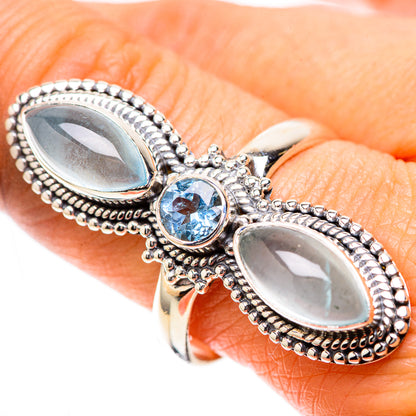 925 sterling silver ring with blue round gemstone and two oval aquamarine stones