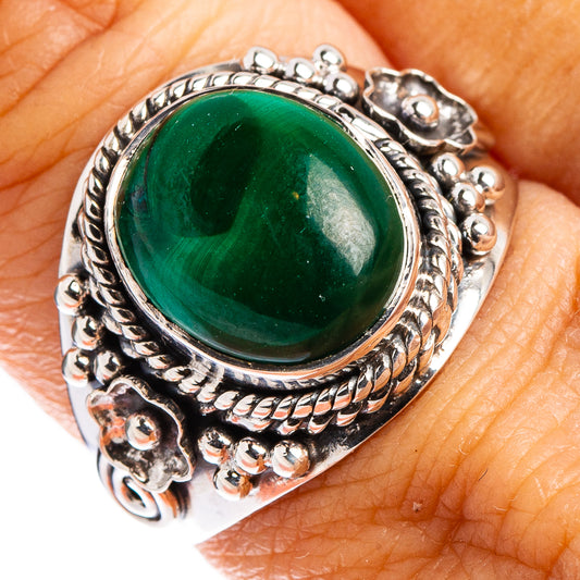 Sterling silver malachite ring with oval green cabochon and ornate bezel