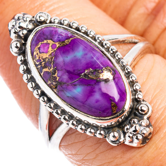 Oval purple gemstone sterling silver ring with beaded bezel and gold-tone veining