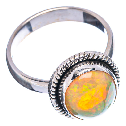 Sterling silver opal ring side view with braided bezel and oval opal center