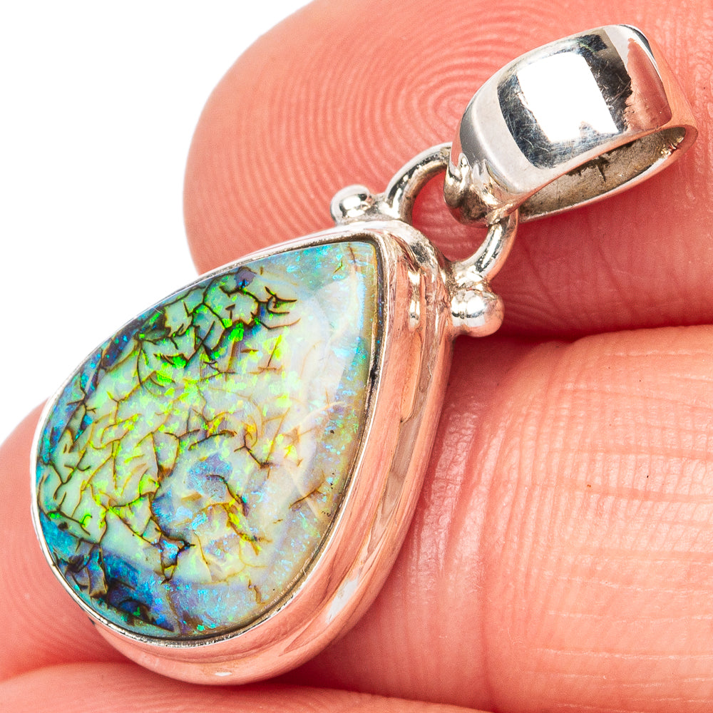 Sterling silver opal pendant with teardrop stone, rainbow iridescent pattern