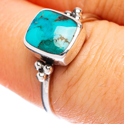 Turquoise cabochon sterling silver ring with square bezel and split band detail