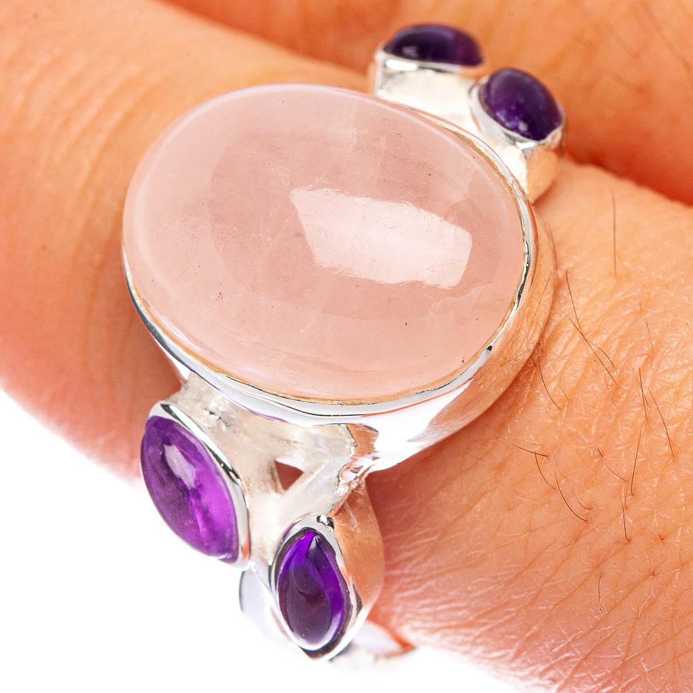 Sterling silver ring with rose quartz oval and three purple amethyst accents