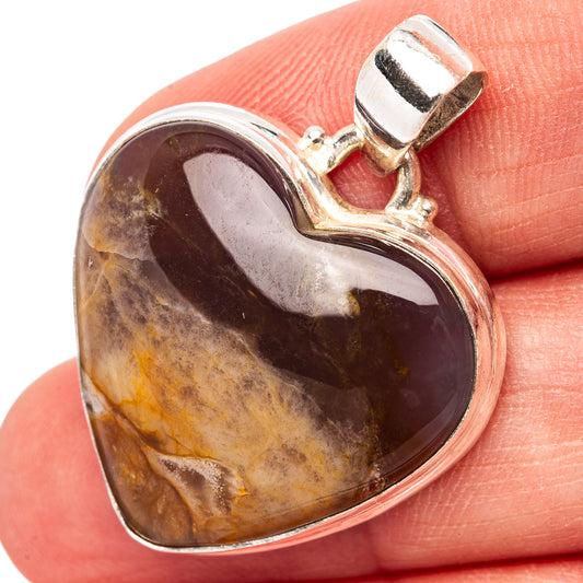 Heart-shaped plume agate pendant in .925 sterling silver bezel with top bail