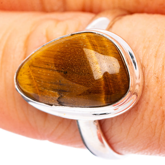 Tiger’s eye sterling silver ring, oval amber-brown stone, polished band
