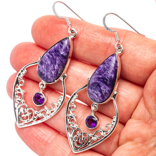Sterling silver amethyst earrings with pear-shaped purple stones and round amethyst drops