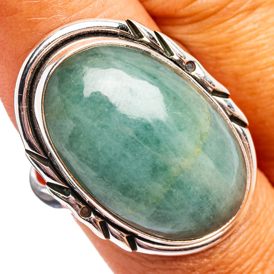 Size 9 oval aquamarine ring, .925 sterling silver bezel with decorative shoulders