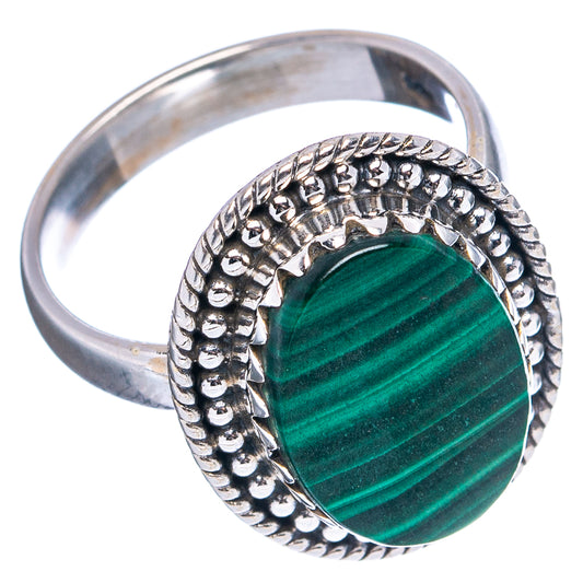 Malachite cabochon ring with oval green stone and bead-textured sterling silver band