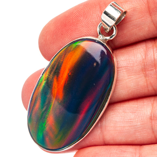 Oval opal pendant on .925 sterling silver bail, iridescent rainbow surface