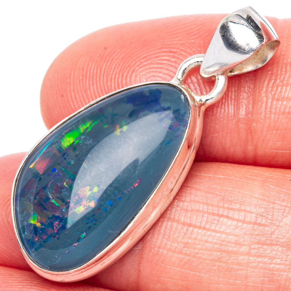 Sterling silver opal pendant with oval blue triplet gemstone and hinged bail
