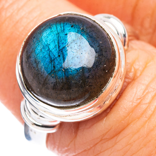 Silver ring with oval labradorite cabochon, blue flash, bezel setting