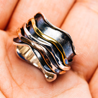Meditation spinner ring, openwork sterling silver with gold inlay swirl detail