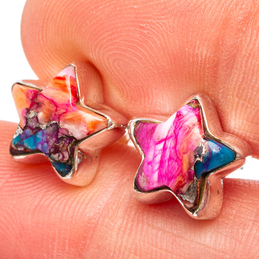 Close-up star earrings in silver with colorful pink, blue, orange resin inlay