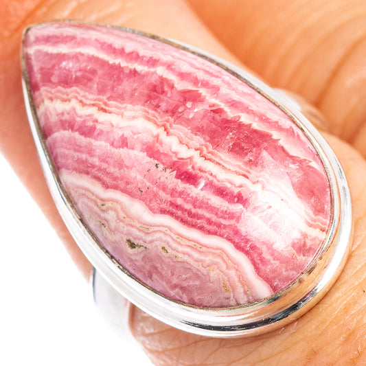 Close-up teardrop rhodochrosite ring with .925 sterling silver and pink striped stone