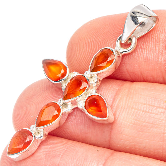 Sterling silver carnelian cross pendant with five orange faceted stone accents