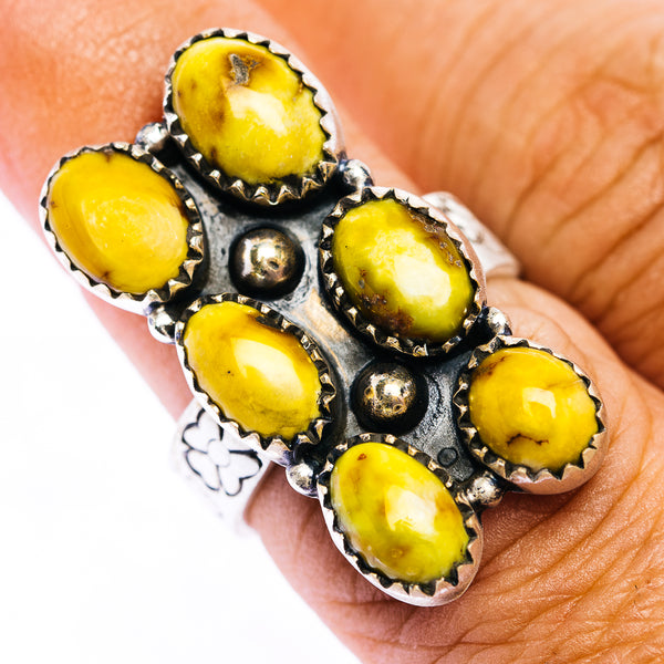 Sterling silver ring with yellow oval cabochon stones and scalloped bezels
