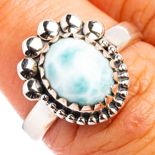 Larimar cabochon sterling silver ring with bead-and-claw border and scalloped band